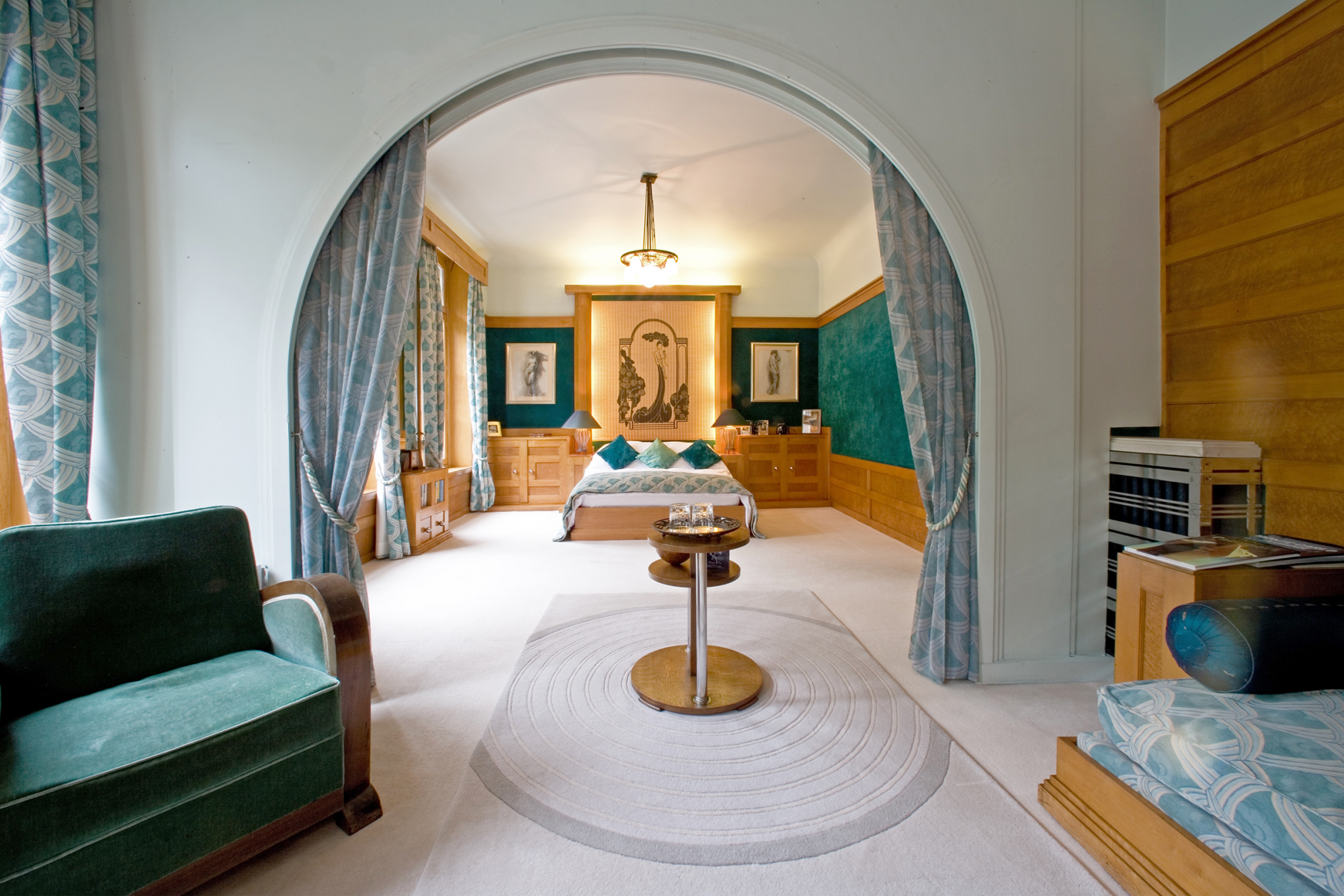 The 1920's Art Deco suite This large suite of rooms showcases original sycamore and birds-eye maple panelling and furnishings with large bed and separate sitting area.