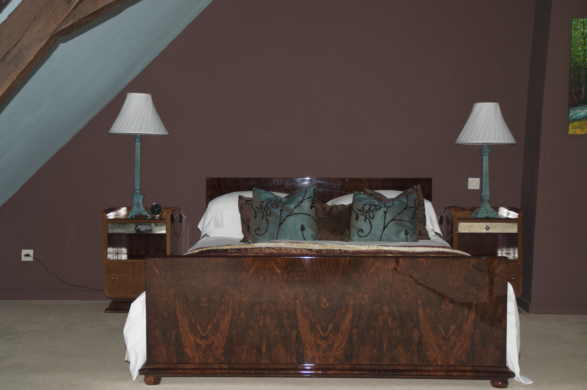 The Macassar ebony bed frame and matching side tables give this room it's name.