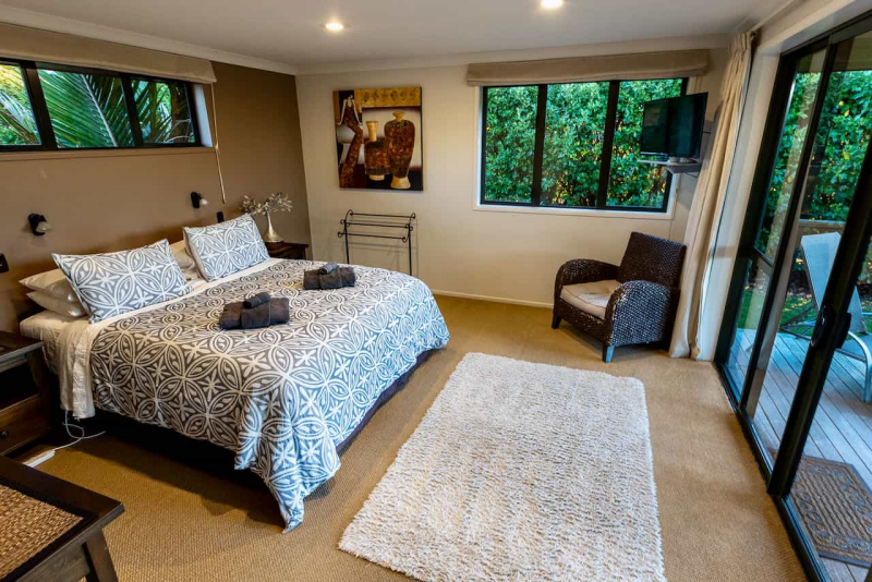 Kakapo Wing bedroom with king bed and single bed