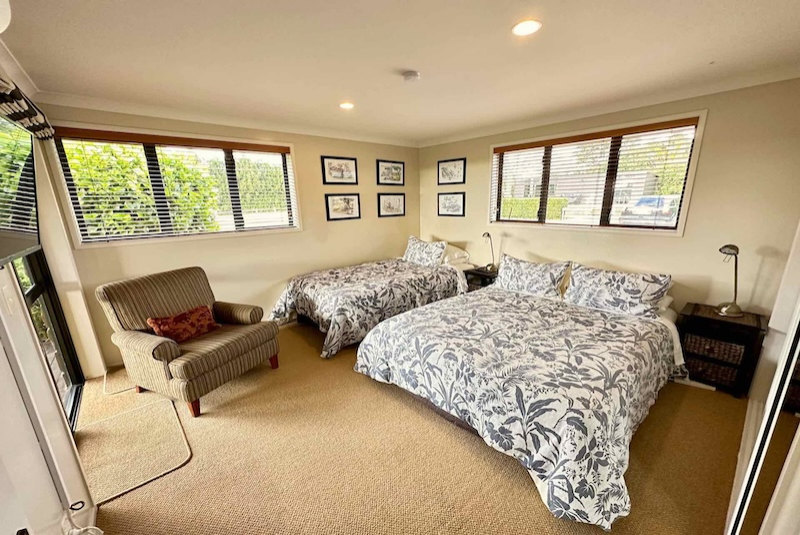 Tui Wing bedroom with queen bed and single bed