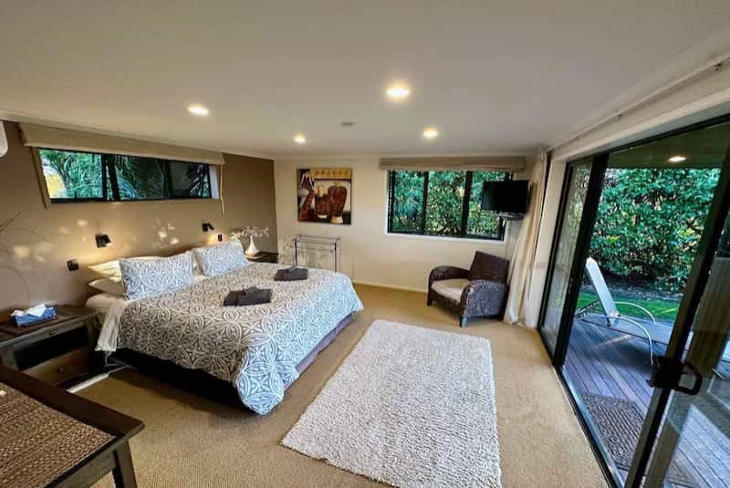 Kakapo Wing bedroom with king bed and single bed